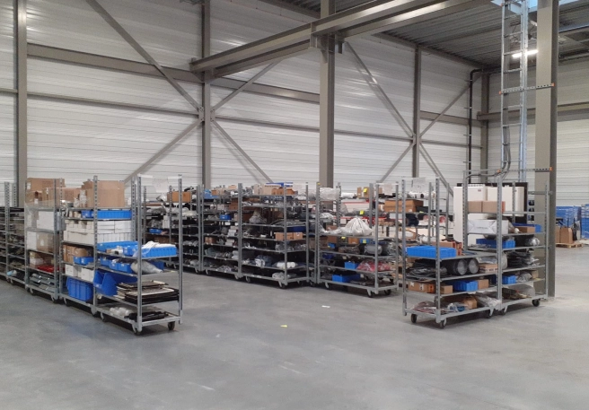 Creatie tijdelijk magazijn & Verhuis naar verticale stockagelift